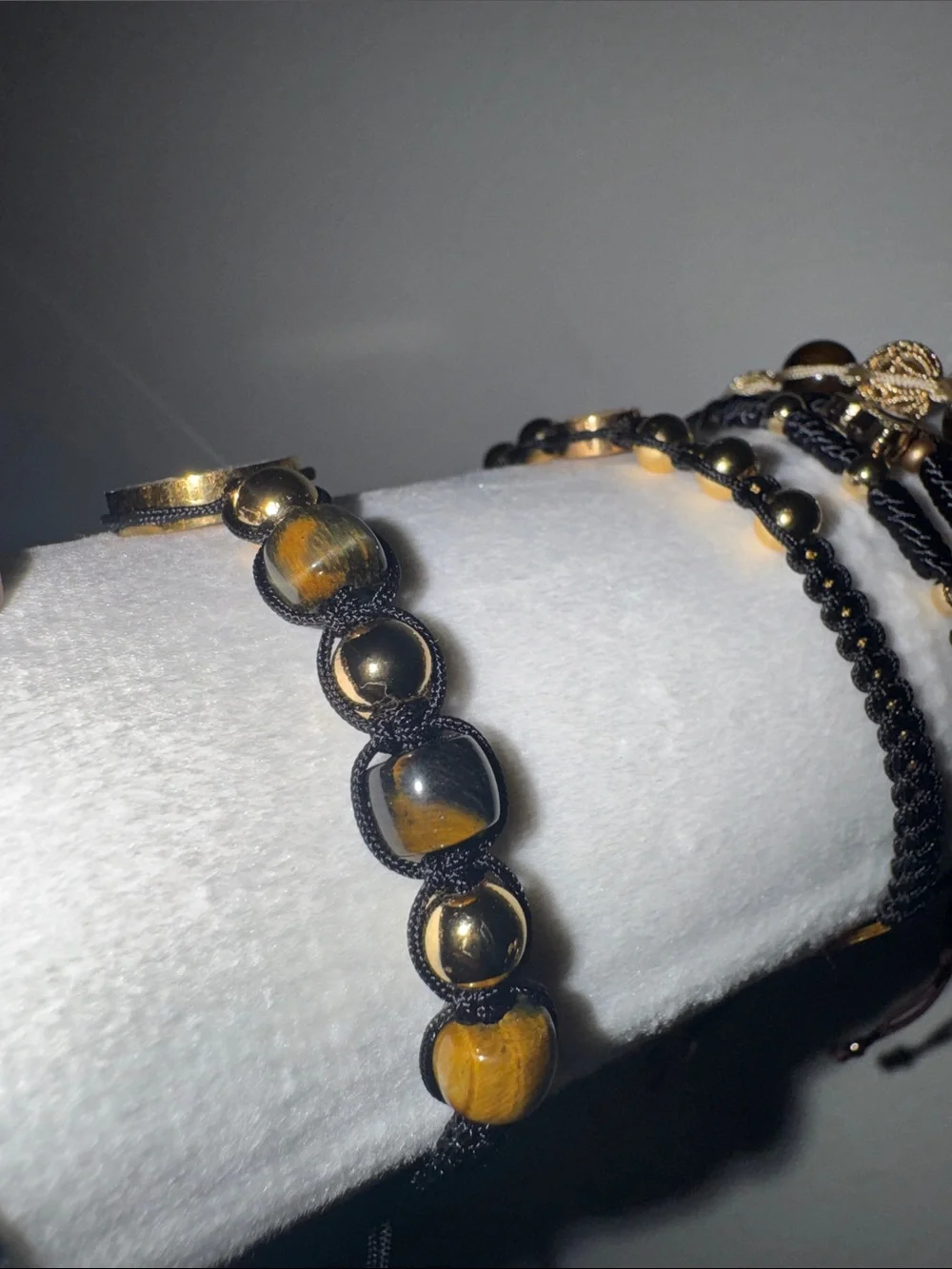 Tiger’s Eye, 14K gold-plated beads, and a Saint Benedict Stainless Steel Medal